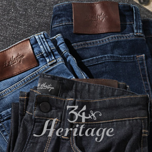 Three pairs of 34 Heritage jeans. 34 Heritage logo in foreground.