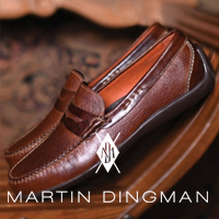 Leather loafer with Martin Dingman logo in foreground.