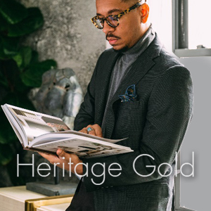 Man in a suit with Heritage Gold logo in foreground.