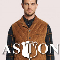 Young man wearing vest with Aston logo in the foreground.